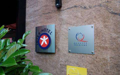 Interhotel signs at the Hôtel Paix République